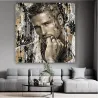 Tableau homme Rebel Mind dans un salon contemporain noir et or